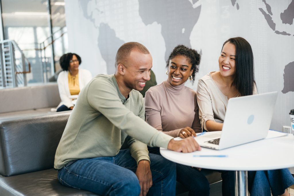 University students working together in a modern faculty lobby